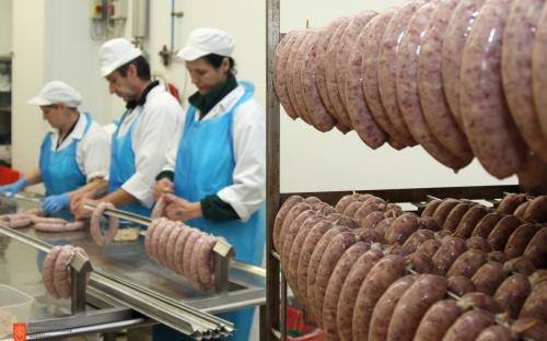 Traditional production of the Carniolan sausages. 