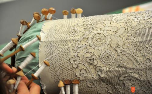 Making Idrija bobbin lace on the festival of handicraft in Slovene Ethnographic Museum.