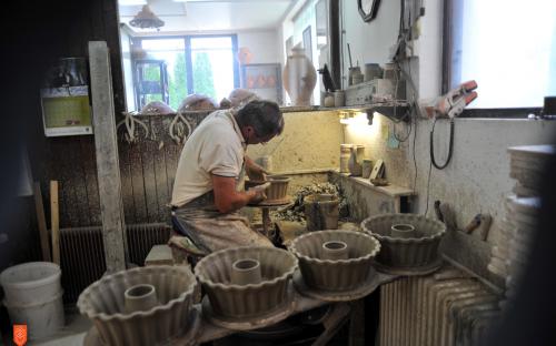 A potter Franc Kremžar while making traditional pottery. 