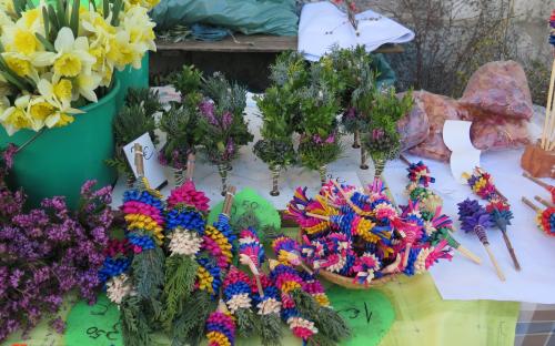 Selling Palm Sunday bunches from Ljubljana area at the marketplace. 
