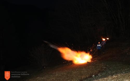 Firing a mortar. 