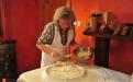 Veronika Hlebec while baking Prleška gibanica. 