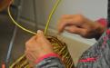 Weaving a basket. 