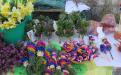 Selling Palm Sunday bunches from Ljubljana area at the marketplace. 