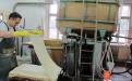 Making paper by hand. 