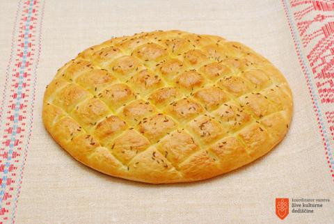 Baking <i>Bela krajina pogača</i>. Photo: R. Vlašič, 2012